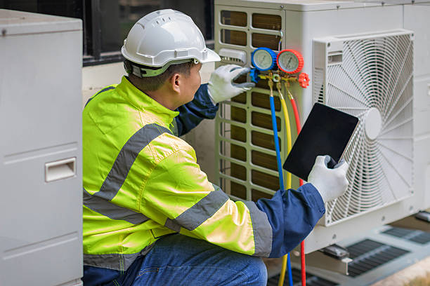 Professional Hvac technician working in Trumbauersville, PA